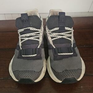 On Running Black and White Sneakers